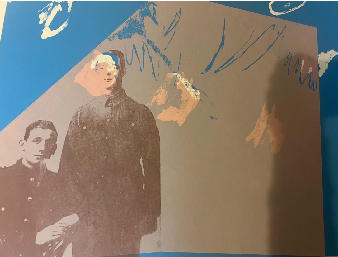 Abstract mural with human figures and dynamic lines.