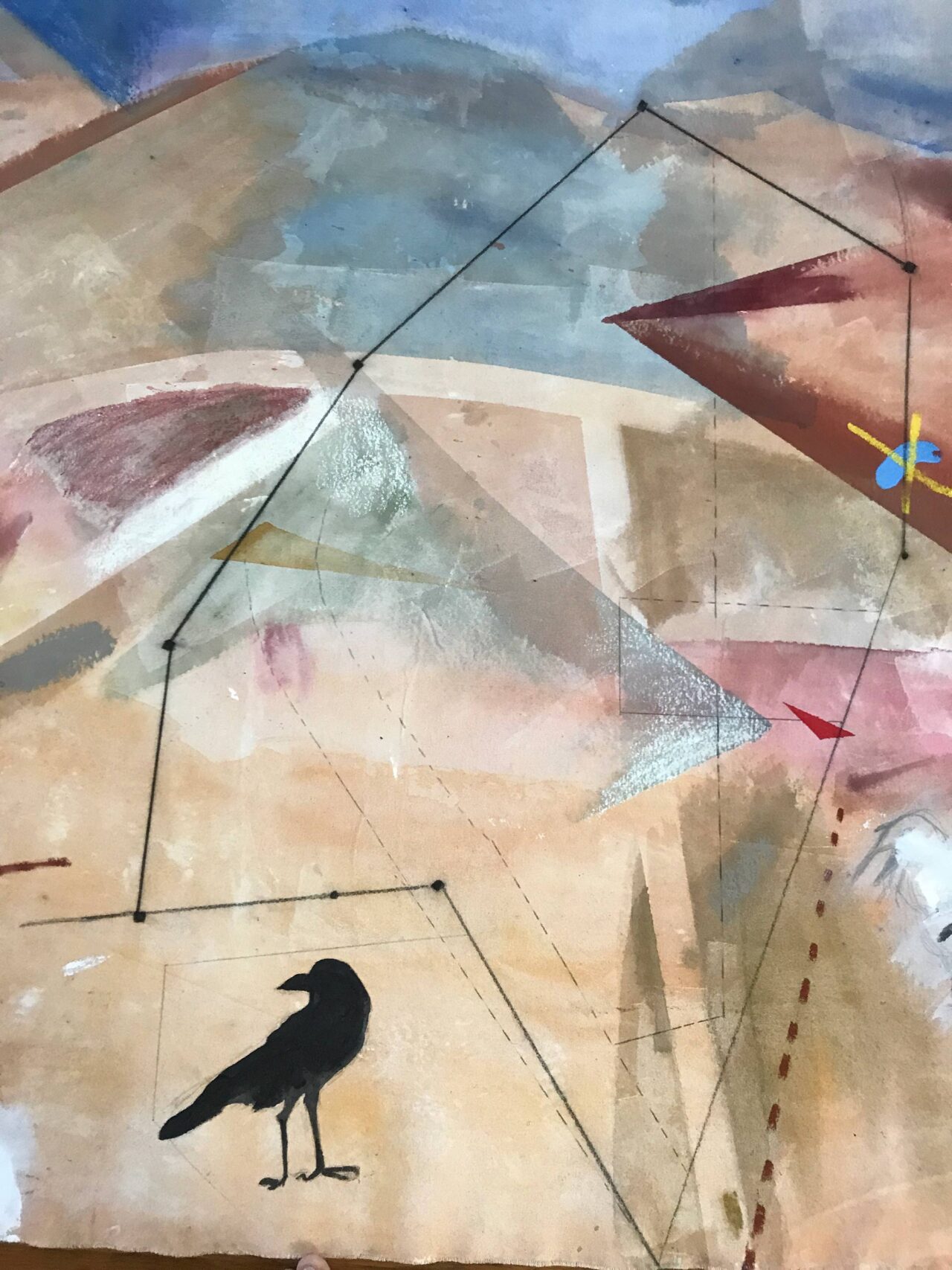Abstract mural with geometric shapes and a silhouette of a bird.