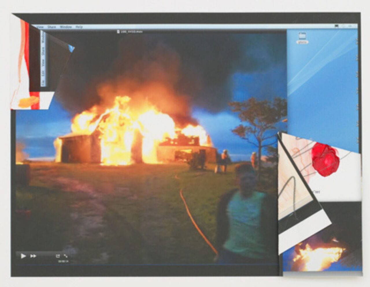A building on fire with firefighters responding at night.